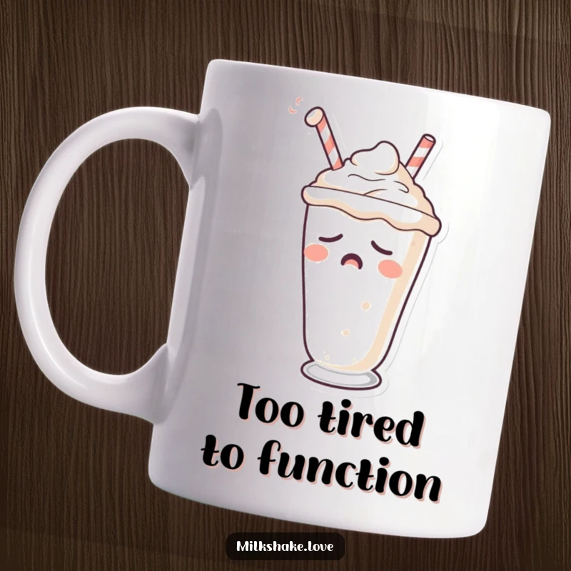 Funny mug depicting a sleepy milkshake character yawning with a drooping straw, conveying deep tiredness.