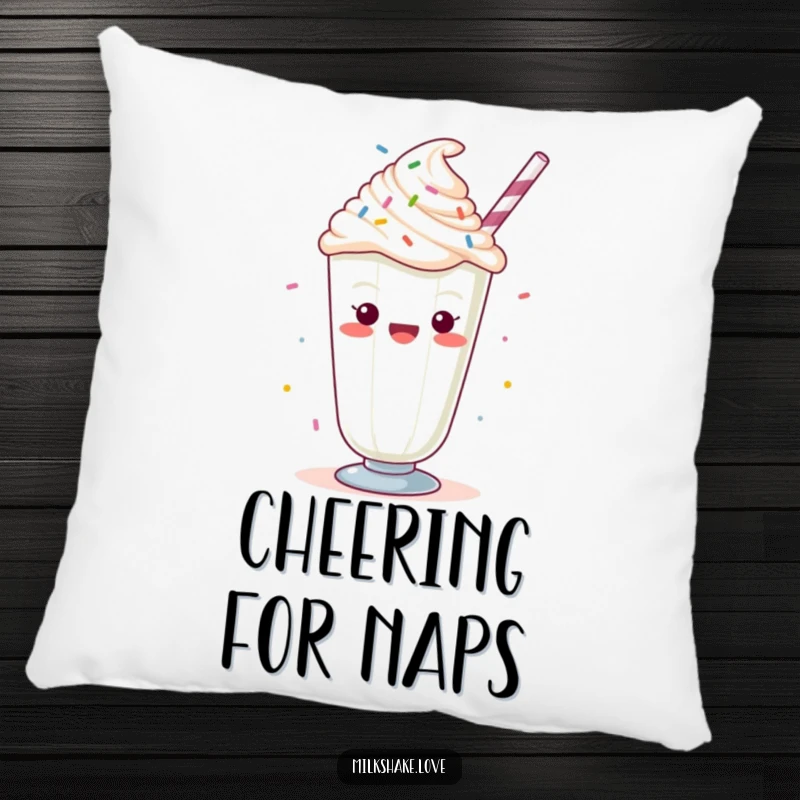 Funny Kawaii milkshake with whipped cream and sprinkles, cheering, featured on a soft pillow for sweet and festive comfort.