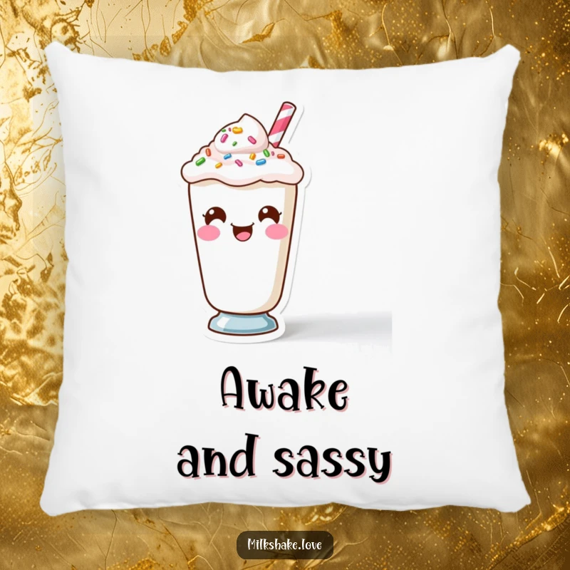 Funny Kawaii Milkshake character making a funny face from its sprinkles on a soft, decorative pillow.