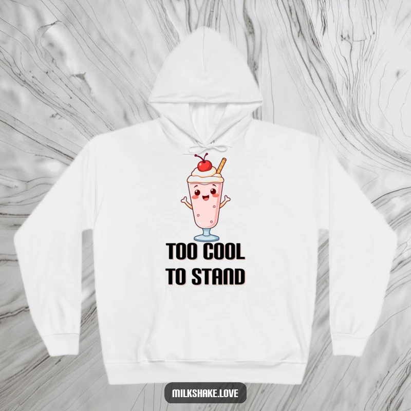 Funny hoodie showcasing a happy milkshake with a cherry, performing a delightful jig, perfect for cozy, humorous lounging.