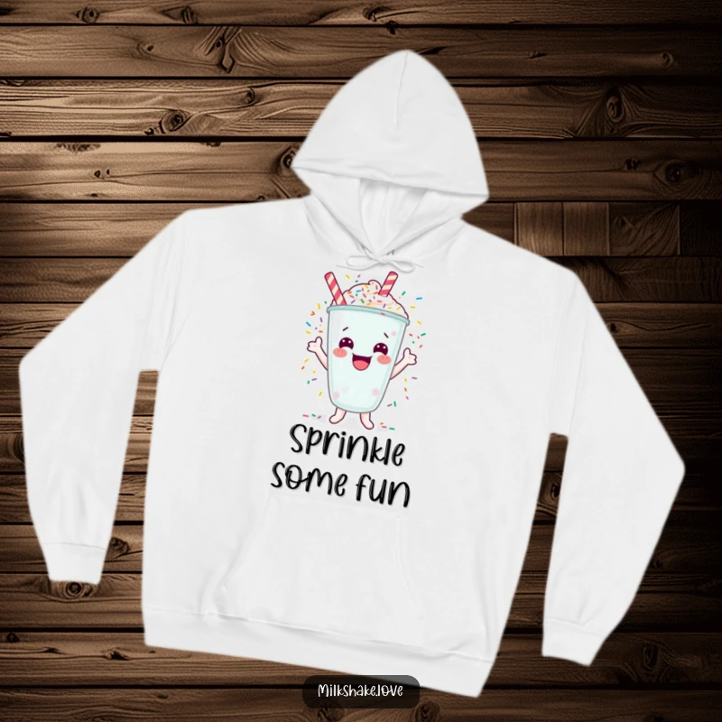 Funny hoodie with a happy milkshake character cheering with colorful sprinkles exploding around it.