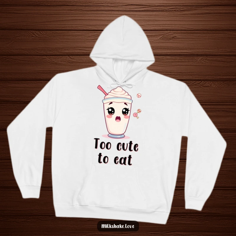 Funny hoodie depicting a surprised milkshake character with immense wide eyes reacting to a floating candy.